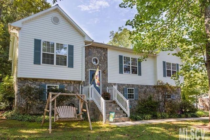 UNDER CONTRACT!  Lovely home located in an established neighborhood with mature trees. Spend time in the park-like front yard and enjoy the flat back yard while kicking the soccer ball around with the kids, or making smores around the firepit. Convenient to I-40, this split-level home is just minutes from everything. Nice open floor plan for entertaining friends and family. The kitchen and adjoining dining room feature a nice space for prepping meals and dining together. The living room has laminate wood flooring which gives this home a modern look and feel. Split bedroom plan features two bedrooms on one side of the home where a full bath is also located. The large master is situated for privacy on the opposite side of the home, and includes a bathroom. The lower level has a family room or work out room, and large laundry room/bathroom with shower. Oversized 2 car garage on this level which opens to the backyard,