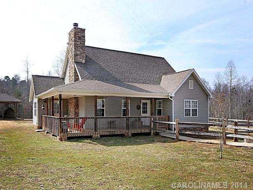 A perfect  mini-farm. 20 minutes to Mountains, or 20 minutes to 321, your choice. Stone fireplace with $5000 thermostatically controlled firebox graces wall of gr8rm.  An overhead loft suspends from above. Large kitchen with flagstone adjacent to casual dining room.  Two pastures with hand hewn lumber,3 stall barn, l min. from Cherryville Country Club.