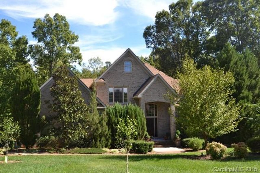 Beautiful home with tons of updates!  Hardwood floors throughout!  Formal dining room, living room or office with french doors and built-ins.  Two story great room has a fireplace/gas logs, spacious granite kitchen with stainless appliances.  Large bonus room and a loft.  Lovely screen porch and deck overlooks large fenced back yard and a salt water pool. There is also a covered pavilion and a fire pit.  A must see home!