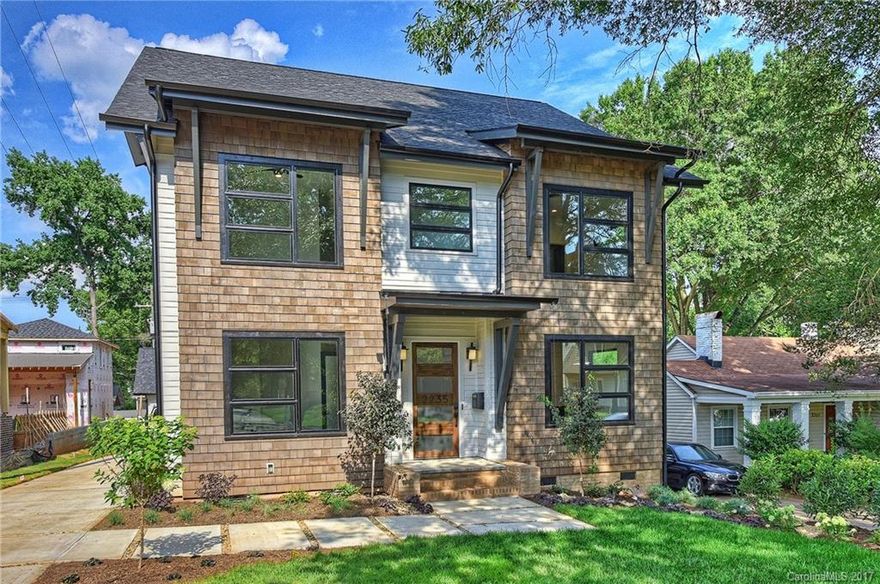 This house is the contemporary craftsman home you’ve been looking for. The kitchen features Miele appliances & has a floating dine-in island with waterfall countertop that is a thing of beauty.  The living room is truly unique with the linear trey ceiling with LED uplighting and a modern fireplace accented with handcrafted tile. You’ll never want to leave the master bathroom with the freestanding soaking tub and finished out in marble laid in a gorgeous herringbone pattern.