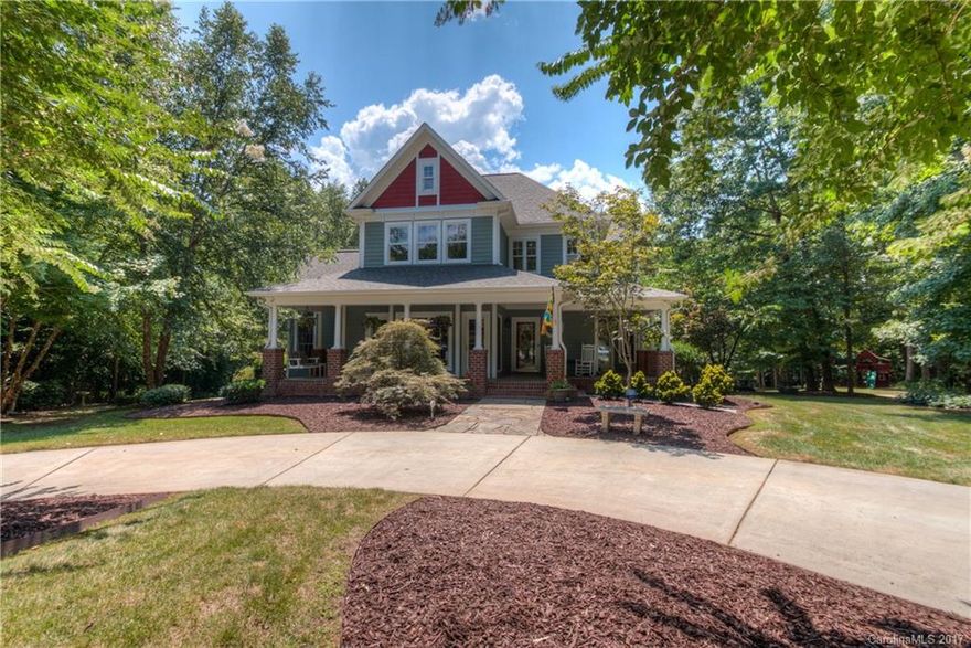 Stunning, Custom Craftsman home. Large, cul-de-sac lot. Wrap around covered porch. Massive, covered back porch w/ Tiger Wood flooring overlooking park like setting. Tons of windows for natural light to flood in. Master on main. 3 berms and 2 baths up. Also 2nd floor bonus w sep kitchen and bath. 9' ceilings. Granite kitchen.