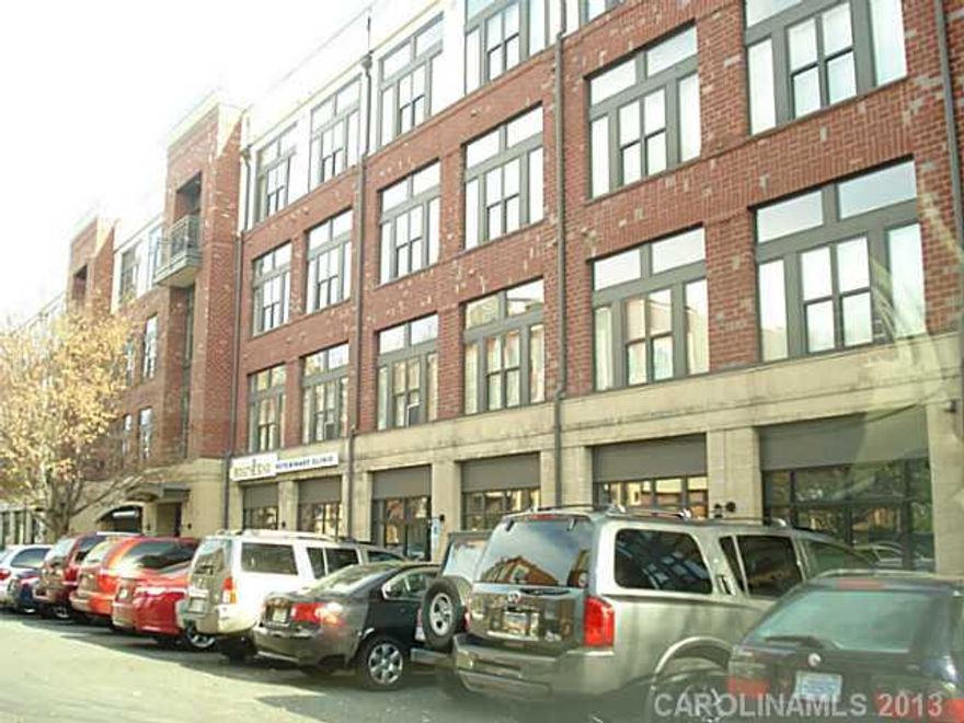 Fabulous condo in heart of Southend! Covered garage parking, secure entry. Refrig, washer, dryer to convey. Quick walk to many shops, new Publix & restaurants. Light rail stop.
