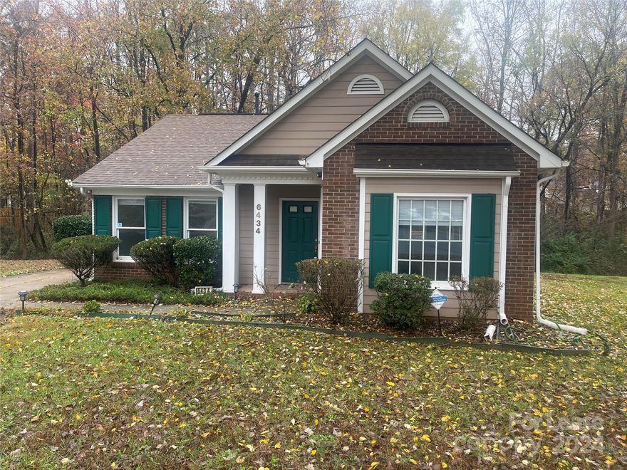 Don't miss out on this lovely 3 bed, 2 bath, 1,200 sq. ft. cul-de-sac home in Charlotte, NC!  You're welcomed inside to a spacious, sunlit great room with a cozy fireplace. A convenient passthrough to the fully equipped kitchen adds to the open feel to the home. Enjoy outdoor dining, relaxing and entertaining on the deck in your wooded back yard! The primary bedroom boasts a full en suite bath, and the two additional bedrooms share a second full bath. Your new neighborhood is near E W.T. Harris Blvd., Albemarle Rd., Charles T Myers Golf Course, restaurants and grocers.