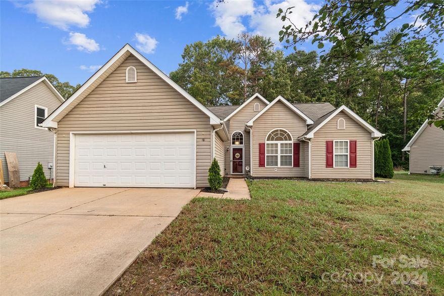 Step into this charming 3-bedroom, 2-bath home, perfectly situated on a generous 0.35-acre lot that offers an exceptional level of privacy and tranquility. With 1,453 square feet of thoughtfully designed living space, this home features a brand-new HVAC system for ultimate comfort. The true gem of this property is its expansive backyard oasis. The upper yard is surrounded by a sturdy, NEW wooden fence, then opens to a peaceful, private retreat with no rear neighbors, making it the ideal setting for both relaxation and outdoor gatherings. The decorative stone retaining wall and stairs adds a touch of elegance to the landscape, creating a picturesque environment. Located conveniently near shopping centers and with easy access to I-77, this home provides both serenity and modern convenience, all with NO HOA. Embrace the opportunity to make this private sanctuary your own.