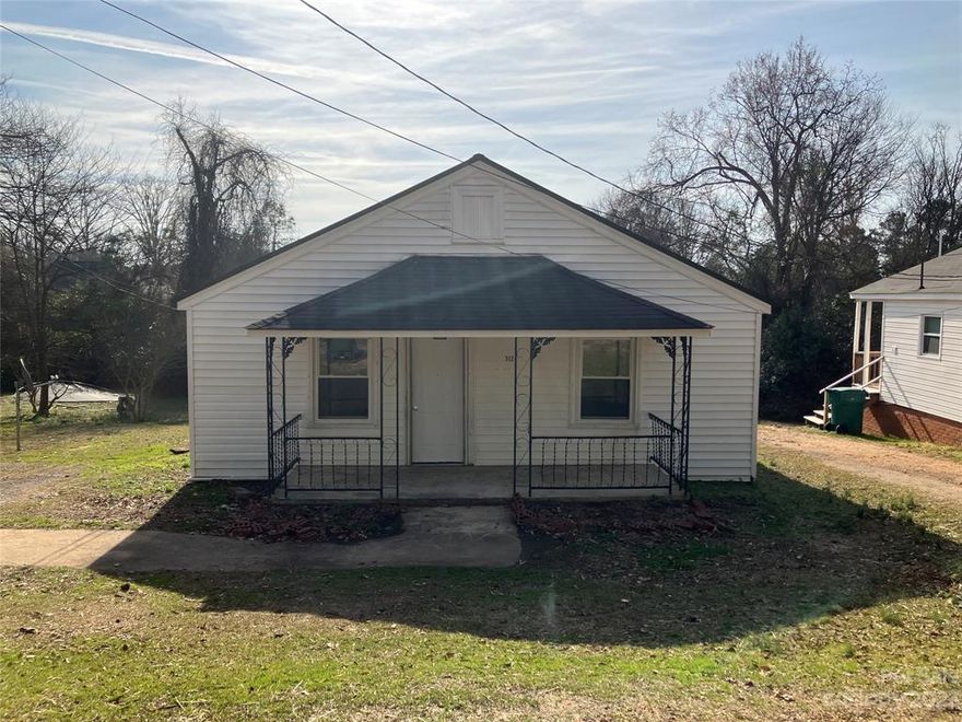 This charming two bedroom one bath home sits in the heart of Wadesboro. It has fresh paint and new flooring in the back bedroom. Seller has all of the flooring provided to finish the floors in the living room and front bedroom. He also has a new shower kit to go in the bathroom. All finishing materials will be sold with the purchase of the property. The home could be an excellent investment opportunity.