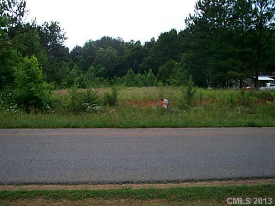 Small acreage tract in a predominantly double wide subdivision.