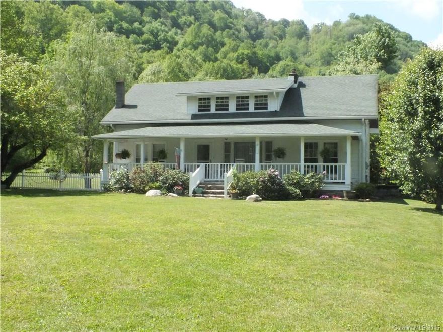 TRUE FARM HOUSE WITH ALL THE CHARM!! Views, 3 bedroom, 1 bath, upper level can be finished with original wood floors just needs heat. Level yard, great garden spots, main level  walk to Town, close to community center. Also close to Blue Ridge Parkway, Smokey National Park, Asheville, Waynesville, white water rafting, Hiking  at Cataloochee, Fishing, Shopping, Restaurants. This is the Farm House dream you have always wanted.