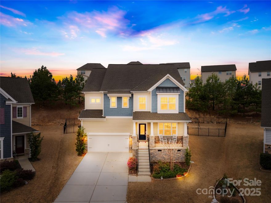 Welcome to this exceptional cul-de-sac home in the highly desirable Waterside at the Catawba community. Just a short ride to the amenity center with a resort-style pool, playground, and sports courts, this home perfectly balances comfort and convenience. The first floor showcases an inviting open living area with a cozy fireplace, a gourmet kitchen with modern finishes, and both a casual breakfast nook and an elegant formal dining room. Outdoor living is a delight with a welcoming front porch, a screened porch at the back of the house, an open deck, and a spacious fenced backyard—ideal for entertaining or relaxing. Upstairs, discover a versatile loft, three generously sized bedrooms with walk-in closets, and a luxurious owner’s suite featuring dual walk-in closets for ample storage. The flooring has also been recently updated in the loft and owner's suite. This home is a true gem, offering style, space, and a prime location.