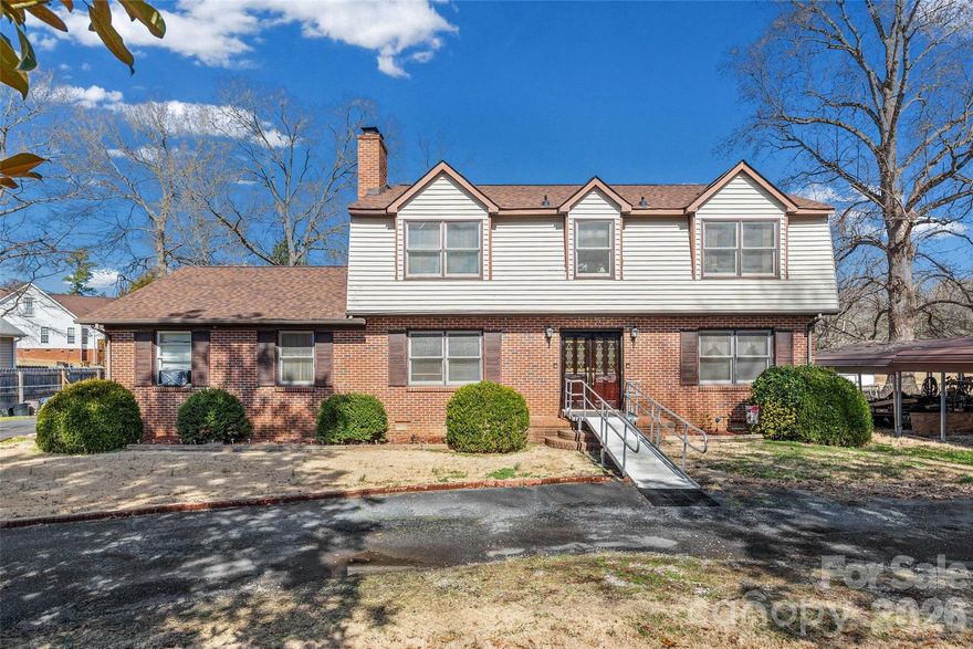 2.34 Acres • Flexible Layout • Minutes to I-77  
Hard-to-find 2.34-acre property in Rock Hill offering space, functionality, and opportunity.

The home opens to a two-story foyer and includes a chair lift for stair access. On the main level, two rooms currently used as bedrooms were originally designed as a living room with wood burning fireplace and a den, offering flexible use depending on your needs.

The kitchen and dining area are spacious and functional, featuring solid cabinetry and newer appliances. There is a full bathroom designed with mobility considerations and an additional half bath.

The off-kitchen storage area being used as a pantry/mudroom leads into a large living space that was formerly a garage and has been enclosed to create additional interior square footage.

At the rear of the home, a windowed porch allows for year-round use, and a large back deck overlooks the acreage.

Upstairs includes four bedrooms with hardwood flooring, ample closet space, and two Jack-and-Jill bathrooms.

The home has been well maintained and would really shine with a few cosmetic updates. 

Conveniently located just minutes from I-77, providing easy access to Rock Hill, Charlotte, and surrounding areas.