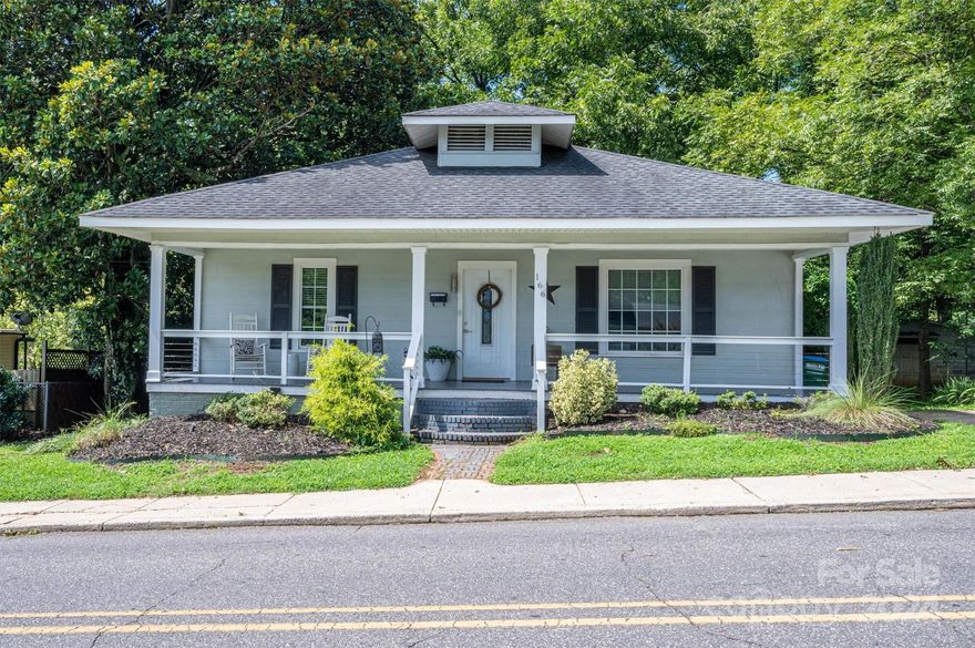 This is the one you have been waiting for! Located on highly desired 8th Ave in downtown Cramerton this charming  home has exceptional updates throughout. Covered rocking chair front porch. Chef's custom kitchen with Sub Zero built-in frig, gas range with Thermador range hood, island with bar seating, tall white cabinetry, granite counters & new tile backsplash. Stunning light fixtures throughout. Shou Sugi Ban accent walls, which is an ancient Japanese architectural wood technique. Gorgeous refinished hardwood floors. Primary suite is huge with large walk-in closet, hand painted accent wall, luxurious ensuite with dual sinks, oversized shower. New electrical & plumbing. Smart home with smart switches throughout. Replacement windows. Washer/dryer convey. Quaint deck on back with built-in rails for potted herbs/plants. Fenced back yard. AC unit completely rebuilt by Gaston Sheet Metal June 2024. Basement living area all hardwoods & ceilings are lower at 6.5', unfinished side is workshop