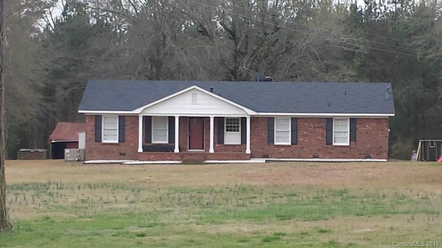 Picture yourself sitting on the front porch looking out at your picturesque pond or on the screen porch enjoying a country breeze. Make this your home in the country and enjoy the peaceful surroundings. This move-in ready home on 11.49 acres includes a private pond and fenced pasture. Home features 2 large bedrooms, 1.5 bathrooms, family room with fireplace, and 1-car attached carport. The workshop/storage building with built-in work bench is wired with powered. Price below recent appraisal!