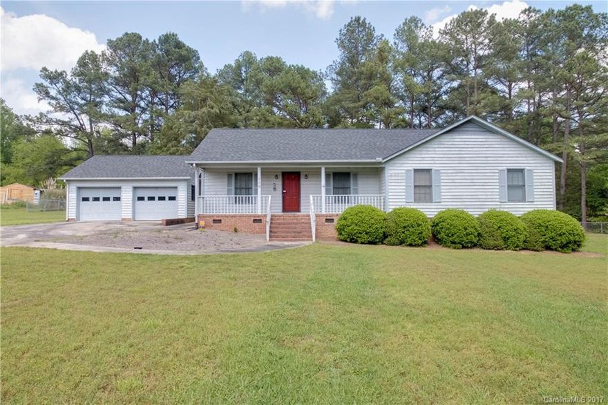 Hard to find 1-story home on 1 acre lot! Large great room w/wood burning fireplace. Kitchen has ample cabinet space & large pantry. Plenty of natural light throughout entire home.Master suite w/dual sinks & large walk-in closet. Spacious bedrooms. Peaceful & private backyard surrounded by mature trees. Deck is perfect for grilling & relaxing.