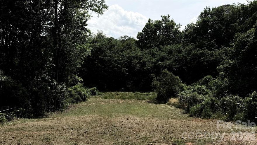 Build your dream home on this exceptional, ready-to-go homesite in one of Charlotte’s most exciting and rapidly evolving areas. The previous structure has been removed, and the lot has already been professionally graded—saving you time and effort as you bring your vision to life.

Included with the property are thoughtfully designed plans for a stunning 3,378-square-foot residence featuring a walk-out basement, rear-load garage, four spacious bedrooms, and three-and-a-half baths. Prefer something different? You have the flexibility to bring your own builder and custom plans, making this truly a blank canvas tailored to your lifestyle.

All the groundwork has been done, including survey and topographical studies, so you can move forward with confidence.

Location is everything—and this one delivers. Enjoy the convenience of being within walking distance to Camp North End, a vibrant hub of breweries, restaurants, and local businesses that continues to grow and thrive. Plus, you’re less than two miles from Uptown Charlotte, putting the city’s best dining, entertainment, and employment centers right at your fingertips.

Opportunities like this in such a high-growth, sought-after neighborhood are rare. Secure your place in one of Charlotte’s most dynamic communities while you still can.