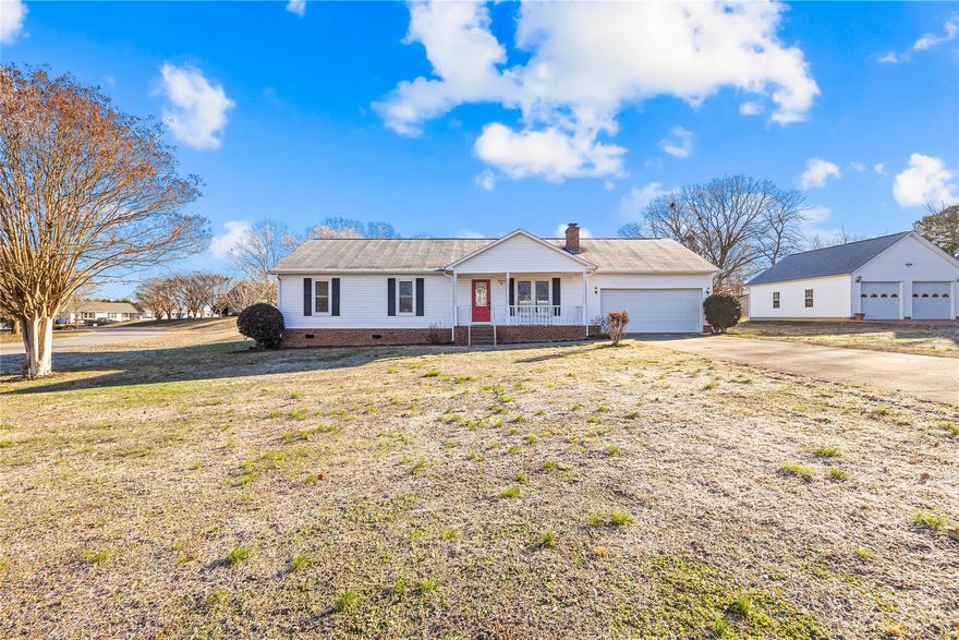 This charming 3-bedroom, 2-bathroom ranch-style residence is perfectly situated on a spacious corner lot. Step inside to the inviting open floor plan, seamlessly blending functionality with style. The heart of the home is the living area, ideal for entertaining family and friends. Imagine gatherings in the kitchen, flowing effortlessly into the dining space. Natural light floods the entire home, enhancing the warm and welcoming atmosphere. Retreat to the comfort of the generously sized bedrooms, each offering something special. The master suite boasts a private en-suite bathroom. Additional features include a second full bathroom, ensuring convenience for all. Step outside to the sprawling yard surrounding the home, offering endless possibilities for outdoor enjoyment. The corner lot provides added privacy and a sense of space. Whether you're relaxing on the front porch or hosting barbecues in the backyard, this home is designed for a seamless indoor-outdoor lifestyle.