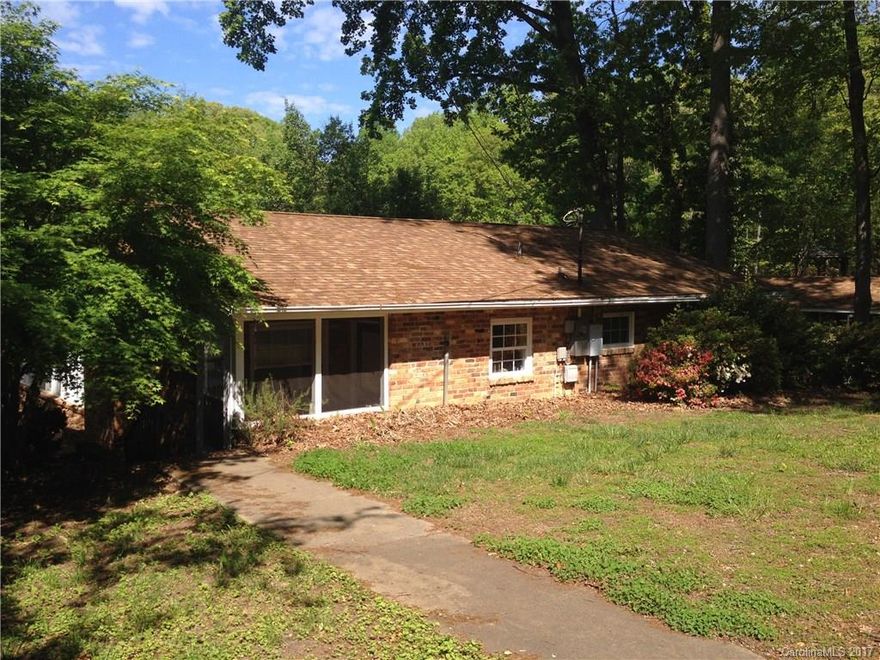 One level waterfront brick ranch home. Open floor plan with huge kitchen area that leads to living room. Great water views on this Lake Norman water front property. Open kitchen with island, secluded neighborhood offers privacy and storage building on property. Property also has a screened in porch separate from home. Walk down to private boat dock and covered area. Great fishing in area and close to Marina.