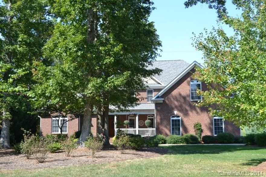 MOTIVATED SELLER!  Beautiful brick home with tons of living space! Formal dining room, 2-story great room with fireplace/gas logs, large granite kitchen with work island, stainless appliances.  Master and guest bedroom/office on main level.  Upstairs houses three additional bedrooms and a huge bonus room!   Enjoy watching Mother Nature on the screen porch and deck!  This home has a security system and irrigation system, 3-car garage.  Clover school district!