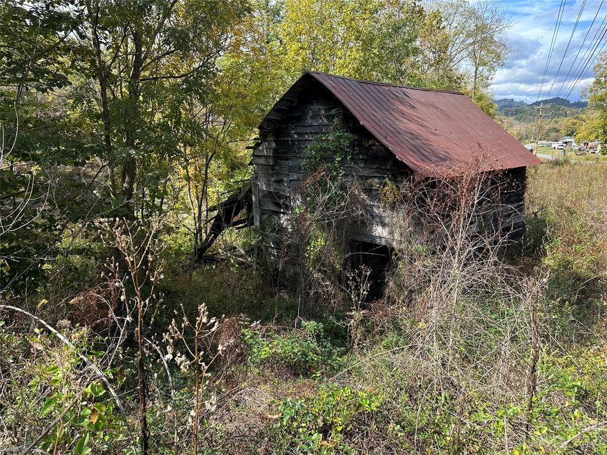 This Property borders the Pigeon River along the its Northern border for approx. 340 ft. The majority of this parcel is located in the Floodway. There is currently a barn on the property. Probable best use would be recreational, storage, or other non-residential use.