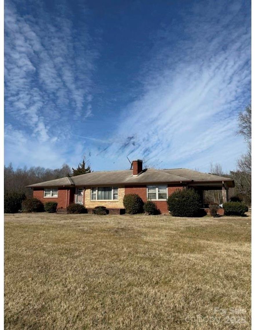 Residential and/or Commercial investment opportunity! Property includes a 3 bed, 1 bath home conveniently located off NC Hwy 150. It is situated on nearly 9 acres presenting an opportunity for investors looking to capitalize on the area's growth and potential. With the proximity to Denver, NC, this location is situated for success.  Shopping and conveniences are less than 1 mile away. Although the area is somewhat remote, it's on the upswing & being closer to Denver, NC, off Highway 150, which means increased visibility & accessibility.  Zoned R-20, property offers versatility for various investment opportunities.  Please check with Catawba about zoning possibilities in relation to this parcel and rezoning.  Property promises endless potential. Check it out today!