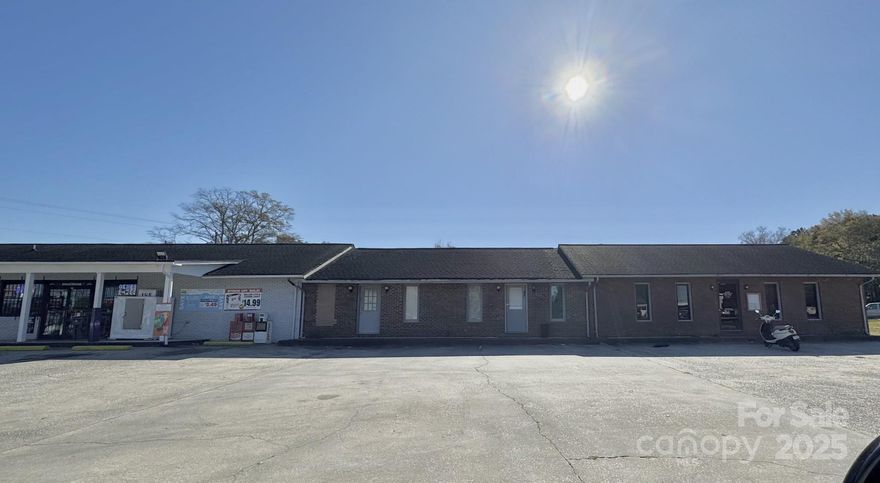 Investors take note. One parcel with 4 buildings. Zoning is GB. 6 potential rental opportunities. 2 are currently rented. Endless possibilities with the variety of businesses that can be in the buildings. Currently 2 auto repair businesses are being rented to. Each has bathroom and roll up doors. One was previously a salon one was an office and a previous restaurant. This large parcel also includes a vacant area perfect for a parking lot or another business. There is a fire wall separating the store and the property that is up for sale. The store is NOT part of the sale. Total property is 1.6 acres on one tax map number. Sold as is.