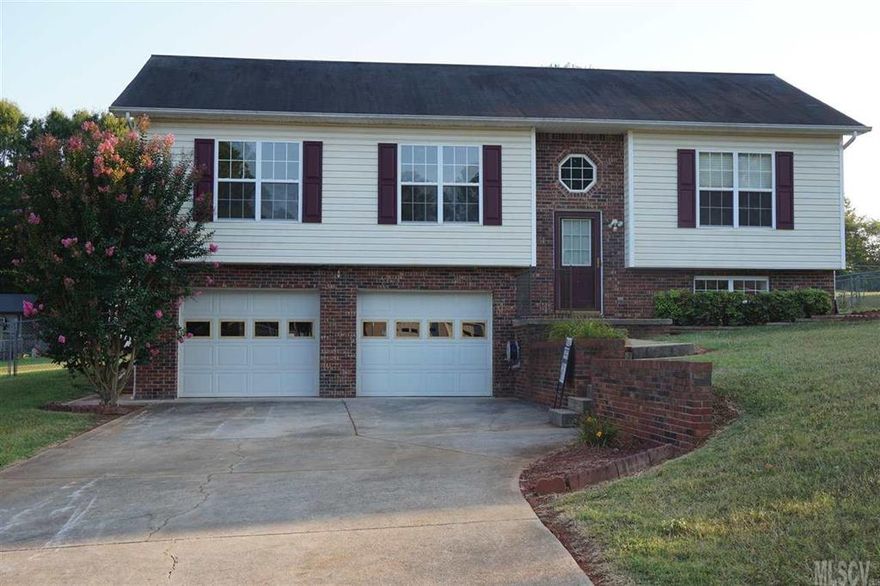 It will just take one look because it is like a new home inside with new carpet and paint throughout. New kitchen cabinets, new flooring, & new plumbing. The home recently had a water pipe burst and what insurance didn't do the seller had done. Upstairs host  an eat-in kitchen with dark cabinets, patio doors lead to the deck to relax with a fenced-in backyard. The hall bath host the laundry area. The master bedroom has a private bath w/the closet in the bathroom. Downstairs host a Rec Room with a closet. Deep and spacious garage. New smoke detector, new breakers, in addition the seller extended the downspouts and has done everything possible to prevent any water again. Refrig, washer, and dryer remain.