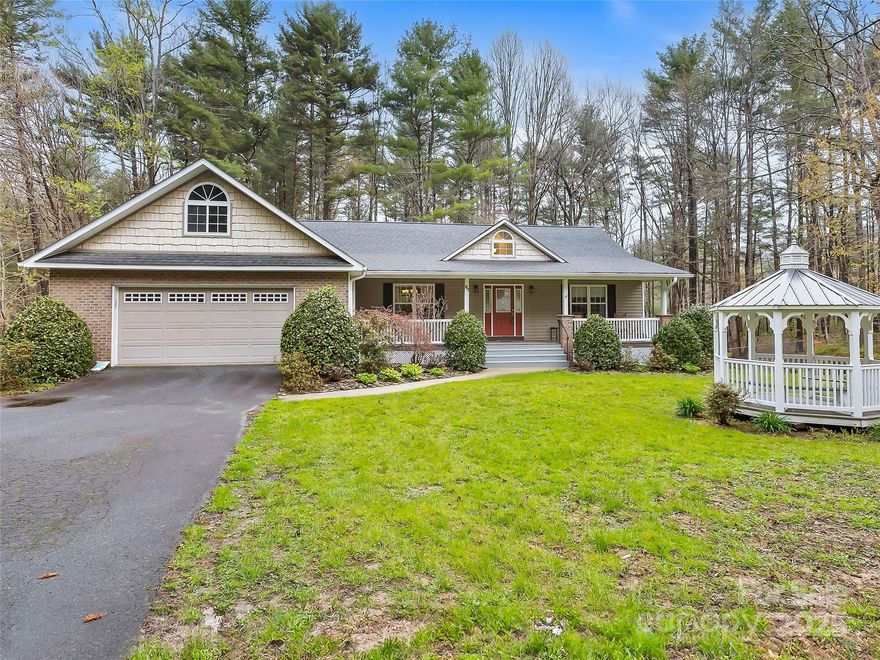 Picturesque mornings and colorful sunsets await you from the rocking chair front porch of this lovely home, It has all the features you are looking for that show off today's lifestyle. The open floor plan features a gas fireplace & vaulted ceiling in living room while the Dining room adds lots of light &  looks out to the spacious front lawn and Gazebo. The kitchen is a great place to enjoy your breakfast in the nook, dine there or out on the back deck. New granite countertops, sizable panty and a small movable island, make this room so inviting. A laundry room is just down the hall. A spacious primary suite with walk in closet, 2 additional bedrooms & full bath complete the main level. Enjoy the family room, office space, snack bar and full bath in the walkout basement, so many possibilities here, take a look today.