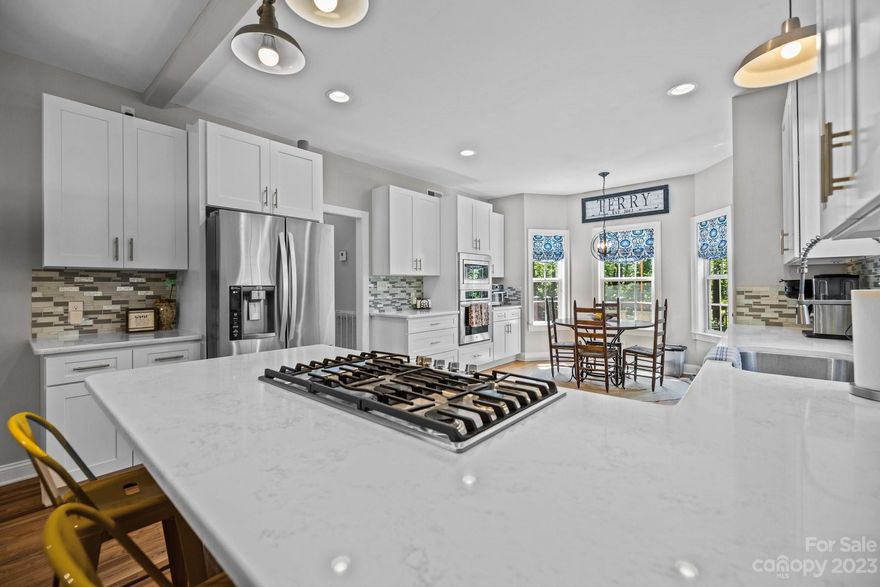 NOW OFFERING A $10,000 SELLER CONCESSION! Use it how you want: off the price, rate buy down, closing costs or future upgrades! Nestled in the woods, this home greets you with a beautiful large screened porch! Inside there is a private room at the front of the home with custom barn doors that could be a great office or playroom, it is a perfect flex space. Enjoy a completely remodeled kitchen with new cabinets, built in appliances, gas cooktop, quartz counter tops and it is open to the DR and breakfast nook. The family room has a cozy fireplace and a built in bookcase. Upstairs features a large primary bedroom and bath, 2 spacious secondary BR's, laundry, a second full bath and storage. Don't forget the finished basement, a great bed/bonus space! Outside enjoy a flat backyard, a covered patio and a storage shed. Don't forget all the amenities of Tega Cay, like Lake Wylie access, parks, playgrounds, Community pool, golf, walking trails, community events plus Fort Mills Top Rated Schools!