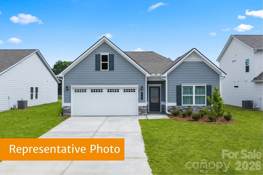 Welcome to the Crawford at Winecoff! This charming ranch home offers 3 bedrooms, 2 baths, and a thoughtfully designed layout perfect for everyday living. Modern touches include 9-foot ceilings, quartz countertops, a stunning oversized kitchen island, and LVP flooring throughout the primary living area ideal for gathering and entertaining. The kitchen also features modern 42' cabinets providing a clean, contemporary finish that complements the open-concept design. Enjoy the outdoors on the 10x12 concrete patio, perfect for relaxing or entertaining. The spacious primary suite is privately situated at the back of the home, offering peaceful views and separation from the secondary bedrooms. The Winecoff community is perfectly located for commuters, offering quick access to I-85 and short drives to Charlotte, Concord, and Greensboro. Enjoy nearby shopping, dining, and local amenities, all within a friendly, new neighborhood that blends convenience with a strong sense of community. Whether you’re relaxing on the back patio, hosting in the open kitchen, or exploring all the area has to offer, this Crawford ranch home provides the perfect balance of style, comfort, and modern living. Don’t miss your chance to make this brand-new home in Winecoff your own!