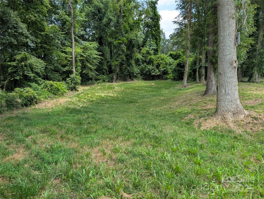 Discover 710 Bouchelle Street: a beautiful lot offering public water, sewer, and electricity at the street, making construction straightforward. The property’s gentle slope and partial clearing offer a perfect build site for a custom single-family home, or outdoor living space.
This lot balances tranquility with convenience—minutes from downtown Morganton, schools, parks, and I-40. For builders and homeowners looking for a smooth path from permit to foundation to finishing touches, this property provides the infrastructure and setting to turn plans into reality.