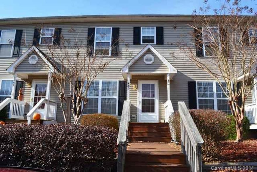 Well updated townhouse w/floating hardwood floors in great room, hallways and both bedrooms. Ceramic tile in kitchen. Fenced backyard, beautifully manicured w/Koi pond. Great home, close to I-77! Don't miss this one