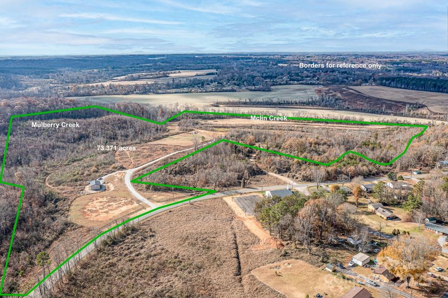 Discover an extraordinary opportunity to own a vast expanse of pure potential spanning 73 +/- acres.  Calling all developers, investors, farming or private estate buyers, this one has it all!  This remarkable property is a blank canvas, ready for you to paint your future. Whether you're dreaming of a private estate, a working farm, a serene recreational retreat or a potential development project, this acreage offers the space and flexibility to bring your grandest visions to life.  Embrace the tranquility of Mulberry Creek Farm while enjoying convenient access to charming downtown Catawba and the surrounding areas. The possibilities are truly endless-seize this rare chance to shape your own legacy.  The property features a 26X40 pole barn with electricity & security and a 10X16 shed.  Two creeks on property, McLin Creek (larger) and Mulberry Creek (smaller, owner named creek with small waterfall feature). Sellers will consider conveying the Mahindra Tractor with attachments, Kawasaki Mule 4X4 and Husqvarna lawn tractor with acceptable offer.  Property was forested prior to owner's purchase.  Since owning, they added the structures on property, roadways through property, had all the stumps removed from the previous timber clearing on right side of property (roughly half the property). Seller can be available to provide a guided tour of the property with a 24 hr+ notice.