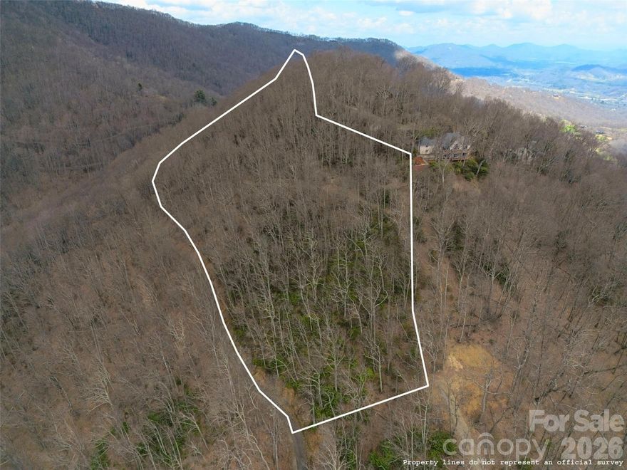 Exceptional land opportunity located in a premier gated community in Waynesville. This peaceful acreage offers a quiet setting with the convenience of paved roads and is situated just a short drive from both downtown Waynesville and the Blue Ridge Parkway. The lot features significant potential for sweeping mountain views and excellent long-range southern exposure. It is an ideal location for anyone looking to build a custom home that combines a private country atmosphere with easy access to local amenities. This property truly serves as a perfect canvas for a private mountain retreat.