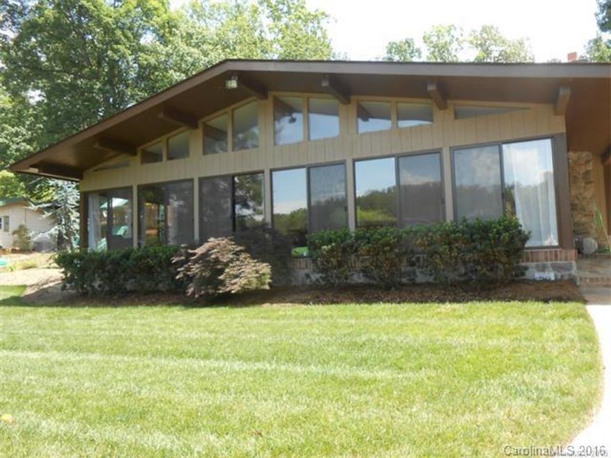 Wonderful remodeled home on High Rock Lake - Home has two separate living quarters - currently used as one - but can be easily divided - Beautiful stonework throughout and stamped concrete - New pier, well, roof, appliances, sheetrock etc. Furniture negotiable