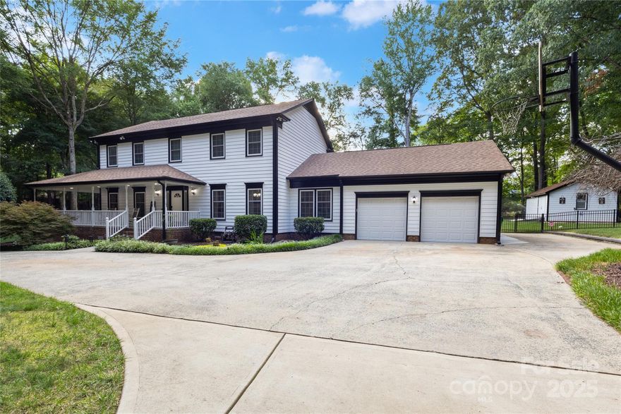 Perfect combination of top-rated schools, unbeatable location, privacy, & nearby shopping & dining. Beautifully maintained 4-bed, 2.5-bth home is situated on a rare 2-acre lot just 1 mile from Waverly, Rea Farms, & The Promenade, you'll enjoy easy access to upscale shopping, dining, & entertainment while still having the peace & space of a private retreat. Inside, the home is immaculate & move-in ready, featuring spacious living areas, abundant natural light through breakage-resistant, double-pane windows, & thoughtful updates throughout. Durable double-layer vinyl siding offers enhanced insulation & long-lasting curb appeal that has been freshly painted. Step outside & you'll find a fully fenced backyard designed for both relaxation & entertaining. Enjoy a large paved area with an inground pool complete with a hot tub & waterfall, a cozy fire pit, & an outdoor bar under a gazebo—fully equipped with a wine refrigerator & TV. There's even a deck for lounging & a shed for extra storage.
