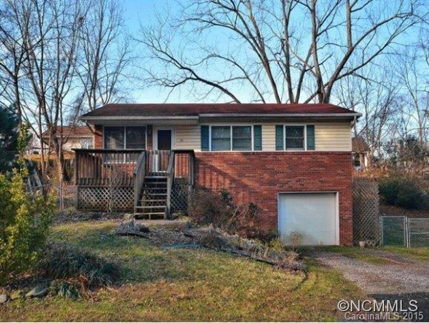 Great West Asheville location only 0.2 mile to restaurants and shopping. This property has fenced back yard on .27 acre with off-street parking. Full unfinished basement with single garage. Property being sold AS-IS.