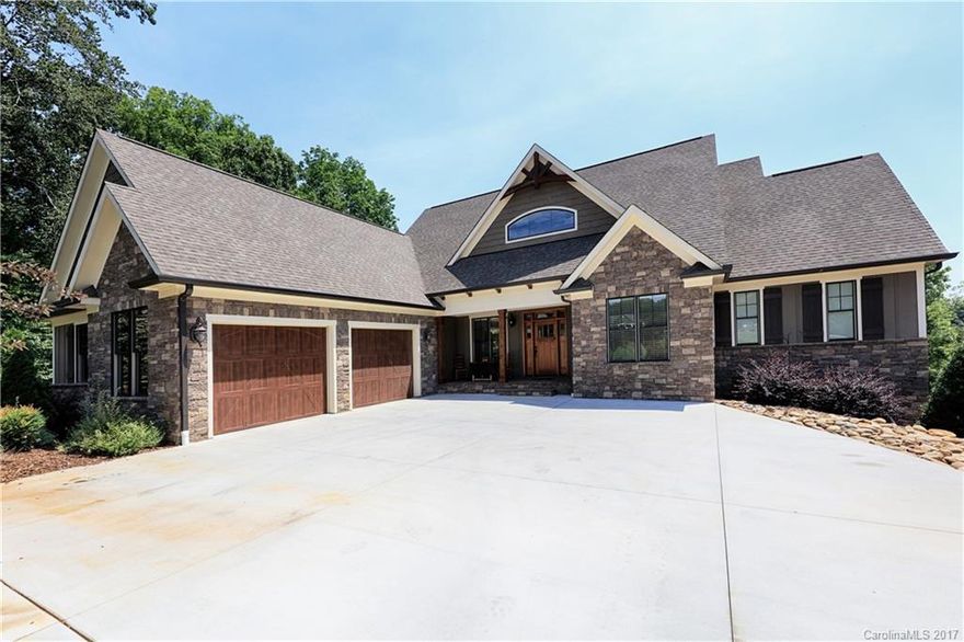 This executive craftsman built ranch with walk out basement will meet & exceed all of your expectations. Immaculately presented throughout! The home boasts sought after Open Floor Plan, gorgeous hardwoods throughout main level, Chef's dream kitchen with huge  island, custom cabinets, granite & SS appliances, high ceilings, beautiful moldings & quality details throughout. Highly desirable master suite on main. Down stairs offers 2nd living quarters. View today-won't last long!