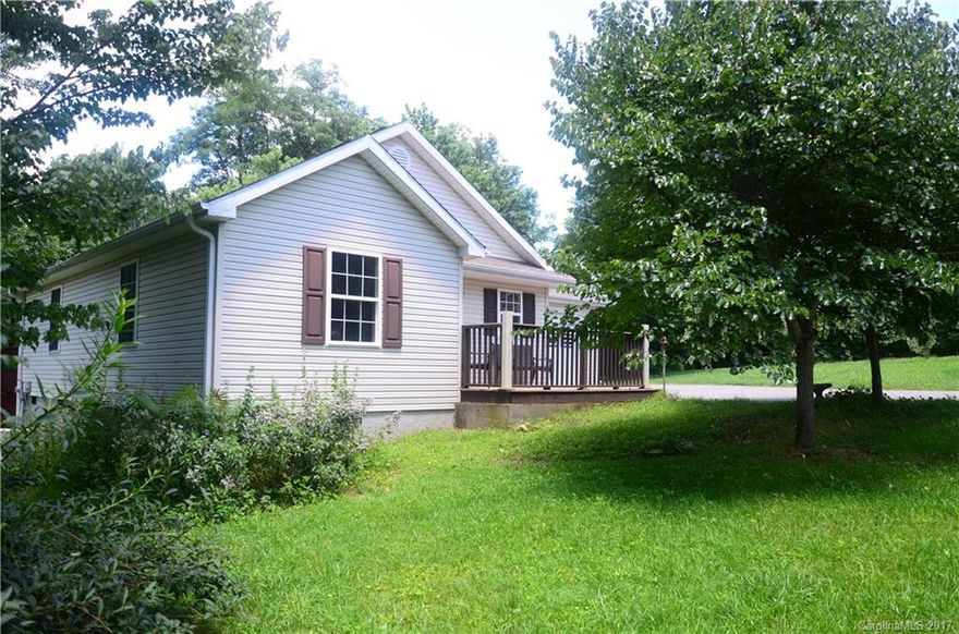 Wonderful first time home buyers dream. Within walking distance from Main Street, Saluda School, Churches and The Library. The home is low maintenance and the yard is an easy keep, ready for your garden. The open great room, with a fireplace, is open to the kitchen and  dining area. The attached one car garage has  interior access.