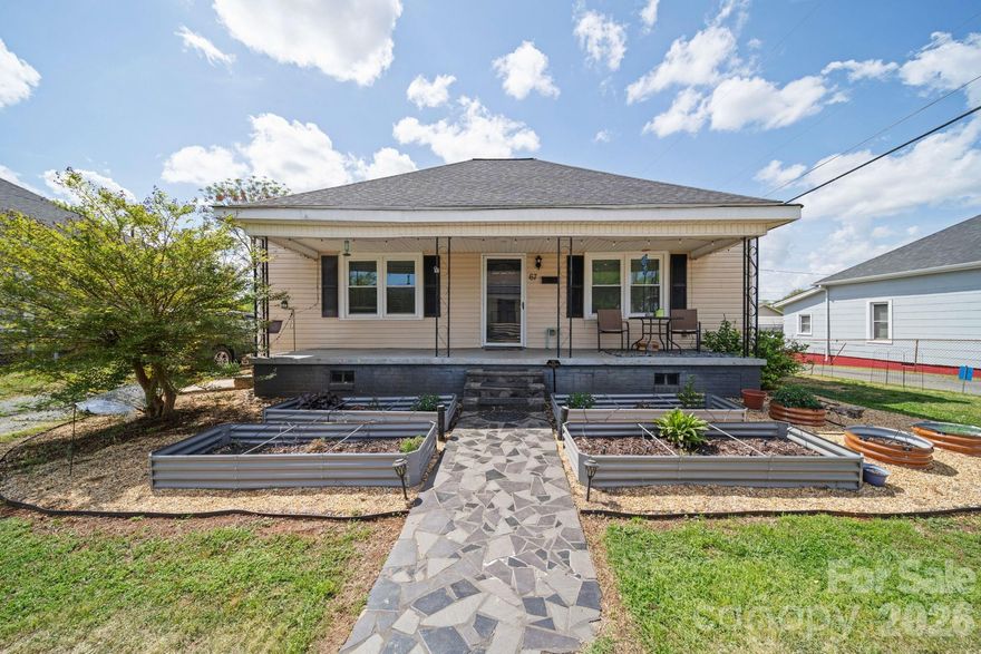 Charming move-in ready home located in the heart of Cramerton, offering a unique blend of small-town character and everyday convenience. Situated just minutes from downtown Cramerton, local parks, and outdoor recreation, this home provides easy access to walking trails, green spaces, and the vibrant community atmosphere the area is known for.
This property is a true gardener’s dream, featuring well-maintained raised garden beds ideal for growing your own vegetables, herbs, or flowers. The outdoor space offers both functionality and enjoyment, perfect for those who appreciate spending time outside.
Inside, the home is move-in ready with a comfortable layout that suits a variety of lifestyles. Whether you're purchasing your first home or looking for a manageable space with charm and usability, this property offers a great opportunity.
Conveniently located approximately 15–20 minutes from Charlotte Douglas International Airport and about 20–25 minutes to Uptown Charlotte, this home provides easy access to major employment centers, dining, and entertainment while still enjoying the feel of a smaller community.
