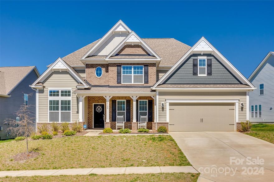 WOW! Price improved to $715k and now the best value in all of Lake Wylie! This stunning home has 5 BRs, 4.5 baths & plenty of room for everyone. The gourmet kitchen is a chef's dream with its double ovens & spacious kitchen island, perfect for cooking & entertaining. The open floor plan creates a seamless flow between the living areas & the flexible space downstairs can be customized to fit your needs, whether it's a home office, gym or a playroom. You'll love the natural light that fills the home & the flooring adds a touch of elegance. With 2 primary bedrooms, including one with a luxurious ensuite featuring a walk-in shower & garden tub, there is plenty of room for relaxation. Upstairs, you'll find 3 additional bedrooms, 2 connected by a Jack & Jill bathroom and the 3rd w/ a private ensuite, providing comfort & privacy for everyone. Cypress Point has amazing amenities, is convenient to highly rated Clover schools & shopping. Don't miss the opportunity to own this beautiful home.