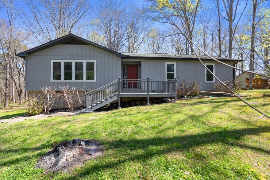 Welcome to your dream home! This stunning 3 bed, 2 bath ranch is situated on over an acre offering a serene and private setting.

As you step inside, you'll be greeted by a bright and spacious living room. Heading into the kitchen you’ll find all stainless-steel appliances, ample cabinet space and breakfast nook.

New carpets and fresh paint throughout the home. Spacious bedrooms, with the primary having an ensuite bathroom, and the two other bedrooms sharing a jack and jill bathroom. The second family room features a wood burning fireplace and built in desk/bookshelves. Head out the new glass sliding doors onto the massive back deck and enjoy your own private oasis, with a sprawling backyard. Both front and back decks have been freshly painted. Other features include a large workshop and wood storage lean-to.

Just a short drive to 77, Dave Lyle BLVD, shopping, including Sam’s Club, Walmart, Lowes, and plenty of restaurants.  

Schedule a tour today!