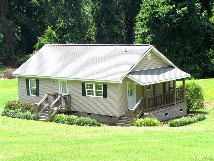 Nice and cozy home settled on 1.5 acres in great location. Home features 3BR/1BA, split bedroom plan, new flooring in living/dining area, open living room to kitchen and dining and endless possibilities. Enjoy your evening outside on the covered porch, watching your kids play in the large yard or get to work on your "to do" projects in the storage building that has electricity. Close to a new preschool and aquatic center opening this fall. This one won't last long!