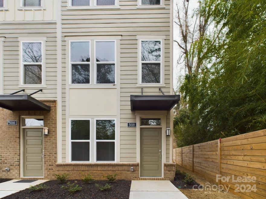 BRAND NEW Townhome with Prime Location! Location: Just a mile away to dining and shopping. Only 3.5 miles to the heart of uptown and less than 1 mile from 277. Main floor features a guest bed room with a full bathroom. Upper floor features open floor plan with kitchen with granite counter tops, stainless steel appliances, living and dining area, half bath and has a walk out to deck area. Third floor features a primary bed room with additional bedroom and with ensuite bath rooms and a laundry room.