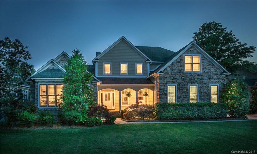 Stunning WATERFRONT home in Country Club Shores w/ private pier, sandy beach & pool. This magnificent home offers so many extras: plantation shutters, gourmet kitchen features GE profile stainless double oven, gas cooktop, island, granite, breakfast bar, & custom backsplash; 2nd Living Quarters on lower level w/2nd laundry, raised planter beds, large flat back lawn approach from hot tub & pool to the sandy beach… all w/a location close to shopping & restaurants w/no HOA. Lake Living at its best!