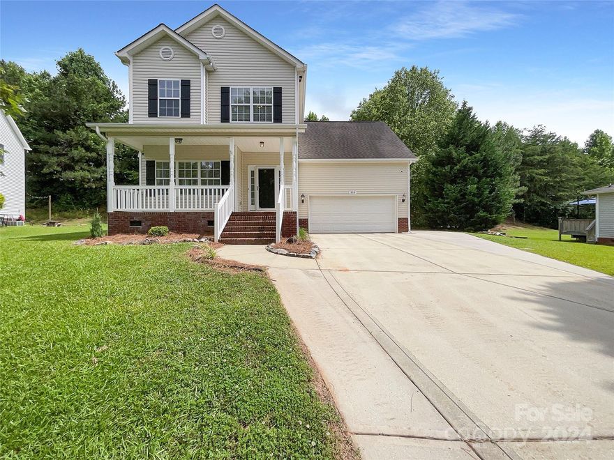 Welcome to your future home, a remarkable property designed with style and function in mind. You'll be welcomed into the warm, inviting, and cozy ambiance set by the elegant fireplace, capturing everyone's attention the moment you walk in. The kitchen is a chef's dream with its full suite of stainless steel appliances, guaranteeing a pleasant cooking experience every time. Venture into the primary bathroom, which features double sinks, adding to the convenience and functionality, and eliminating early morning congestion. Step outside onto the deck, perfect for those sunny morning brunches or evening gatherings as you soak in the tranquility of your surroundings. This home has been meticulously kept and enhanced with a fresh coat of interior paint, setting a tone of newness and cleanliness. The partial flooring replacement adds a modern touch and breathes life into the property, enhancing its irresistible charm. Don't miss out on your opportunity to own a property that blends style