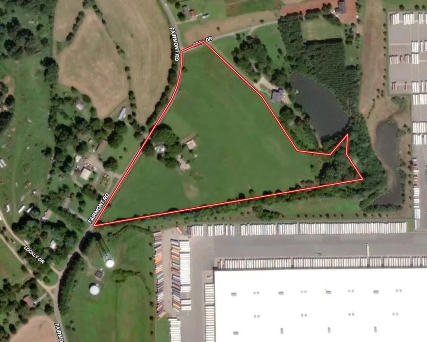 15.35 Acres located in Iredell County less than 1 mile off I77. This parcel is directly adjacent to Lowes distribution facility and the future land use plan shows the property as Employment Center Industrial/Flex/Office. Iredell Water Corporation has a waterline along Fairmont Rd. Over 1000 of paved road frontage along Fairmont.