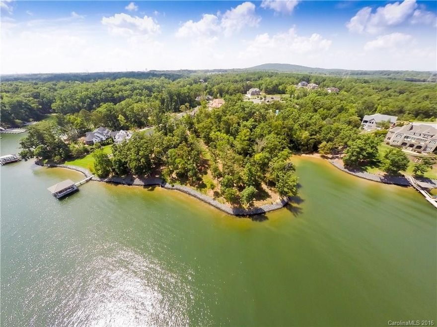 Prime waterfront lot on Lake Wylie in the gated community of Handsmill! Located on a Cul-de-sac offering
amazing views from this point lot along with deep water. Award-winning Clover schools and low SC taxes with
easy commutes to the Charlotte airport, as well as, uptown Charlotte! Approx. 300 ft of shoreline is fully rip
rapped so all you need to do is design your home and dock to your needs! It's rare to find great lots with big
views under 400K on the SC side of Lake Wylie- call today!!