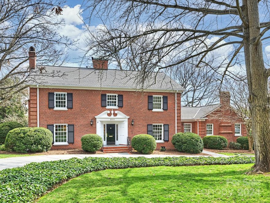 This lovely 2 story traditional brick home sits on a wonderful .8 acre lot in Myers Park. Large rooms with windows overlooking beautiful landscaping. Off of the marble floored entry is a large living room with a gas fireplace as well as a large dining room. Additionally, there is a spacious family room, guest suite/fourth bedroom. Separate side entrance opens into mud room with laundry area off of the kitchen. Kitchen has built-in Sub Zero refrigerator/freezer, 2 separate ovens and a gas cooktop.There is also a fabulous media/playroom/workout room downstairs with french doors leading outdoors. Upstairs features the primary suite with separate dressing room, additional two bedrooms with a connecting bath. Incredibly beautiful back yard with terraced gardens just a block from Queens University.