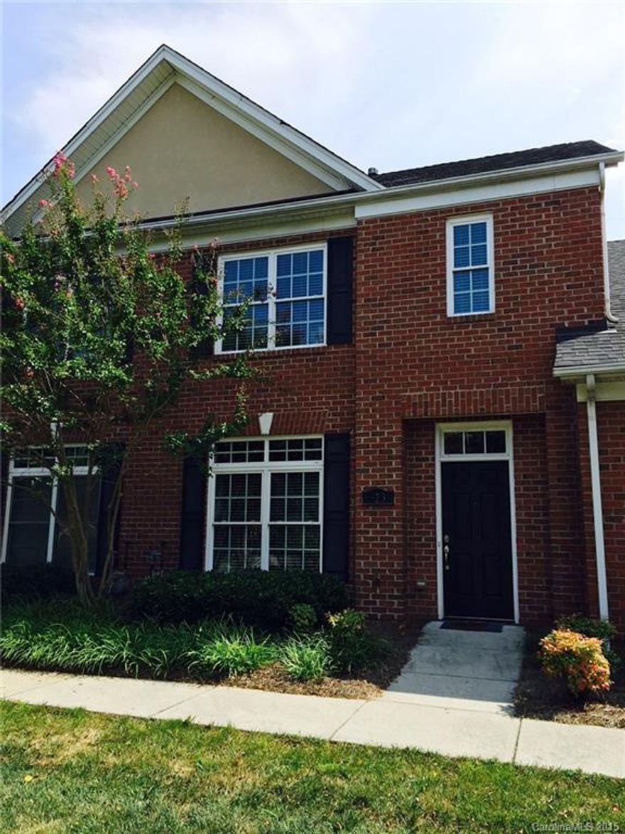 Perfectly located townhome close to shops, restaurants, entertainment and I-77.  Settle right in to your many upgrades, including new laminate wood floors on main, 42" cabinets, granite counter tops, tile backslash, and stainless steel appliances. Refrigerator to remain. Private master bedroom with luxurious master bath. Covered walkway to two car garage and large storage area above garage.