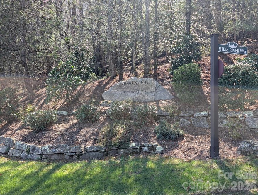 Build your custom mountain estate on this expansive 1.75-acre homesite featuring incredible long-range view potential within the prestigious, gated community of the Homestead at Mills River. Known for its architectural excellence and upscale homes, this prime parcel offers the perfect balance of a private, wooded sanctuary and high-end neighborhood luxury. The location is remarkably convenient, situated just outside the Pisgah National Forest for endless outdoor recreation, yet only 15 minutes from the Asheville Regional Airport and a short drive to the region’s best shopping, dining, and breweries. Residents enjoy top-tier community amenities, including gated security, paved roads, and underground utilities with natural gas, as well as exclusive access to the private Homestead River Reserve—a 10-acre riverfront park featuring a clubhouse and prime fishing spots. This is a rare opportunity to capture the stunning Blue Ridge horizon and experience the very best of Western North Carolina living.