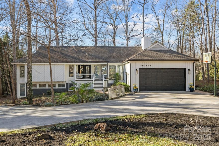 Prepare to be impressed with this beautifully renovated home in River Hills on a half acre lot with tons of privacy and a U-shaped driveway. The gourmet kitchen features beautiful white cabinets, quartz counters, a large center island and stainless appliances that are all less than a year old. Every room of the home has large windows for tons of natural light, and the living room features a grand stone gas log fireplace. The primary suite opens to the back deck and features a large tile shower, a standalone tub, double sinks and a large closet. The secondary bedrooms are generously sized and are connected by a newly renovated jack-n-jill bath with a new vanity and tile shower. The lower level features an oversized bedroom, a full bathroom and a large great room w/ a kitchenette. The expansive deck leads to a backyard oasis with a stone fireplace, a fountain, a covered seating area and an outdoor kitchen. Gated Golf Course Community, Lake Access, Low Lake Wylie taxes and Clover Schools!