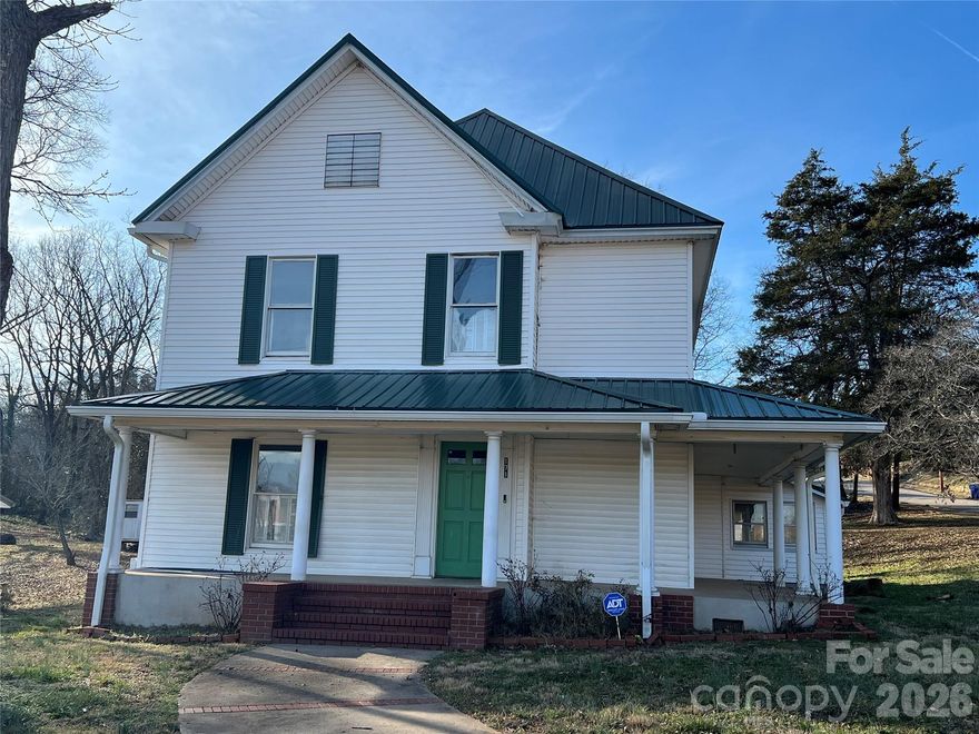 Motivated Seller! Bring offers! 4 bedroom, 3 bath home in Rutherfordton. Home sits on a .50 acre corner lot.  Large eat in Kitchen, fireplace in living room, 1 bedroom on main floor and 3 bedrooms upstairs. There is a huge landing area upstairs that could be used as an office or library. Bonus room off living room. Mud room off kitchen that has laundry room and bathroom. This home offers a lot of space. Heatpump was replaced in 2020. Home has just been freshly painted inside, stairs stained, and some new flooring. The upstairs bathroom has just been updated with new vanity, full walk in shower and paint. Concrete patio in back for entertaining and the front and side porch are perfect for relaxing. You can walk to Rutherfordton Downtown area for restaurants or shopping. 7 minute drive to  Hwy 74 for commutes. Sold AS-IS